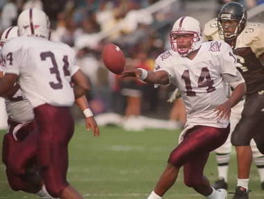 Alabama A&M quarterback Tony Bellamy makes pitch to Curtis Donnell in Bulldogs' 1999 Magic City Classic win
