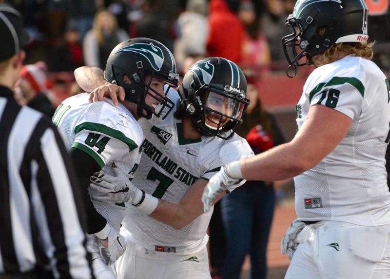 COURTESY: JESSE TINSLEY/THE SPOKESMAN-REVIEW - Portland State quarterback Alex Kuresa (center) celebrates with tight end Cam Sommer (left) and offensive lineman Mike Davis after Sommer's touchdown catch from Thomas Carter during a 34-31 PSU victory Saturday at Eastern Washington.