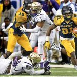 North Carolina A&T running back Tarik Cohen (28) runs for one of his three touchdowns during a 41-34 win against Alcorn State in the Celebration Bowl at the Georgia Dome in Atlanta on Saturday, Dec. 19, 2015. (Hyosub Shin/Atlanta Journal-Constitution/TNS)