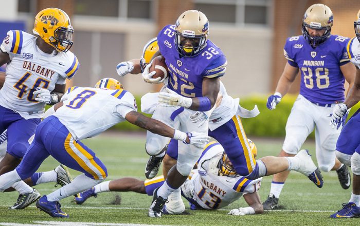 James Madison running back Khalid Abdullah (32) finds his way through traffic during the second half of an NCAA college football game at Bridgeforth Stadium in Harrisonburg, Va., September 19, 2015. (Daniel Lin/Daily News-Record)