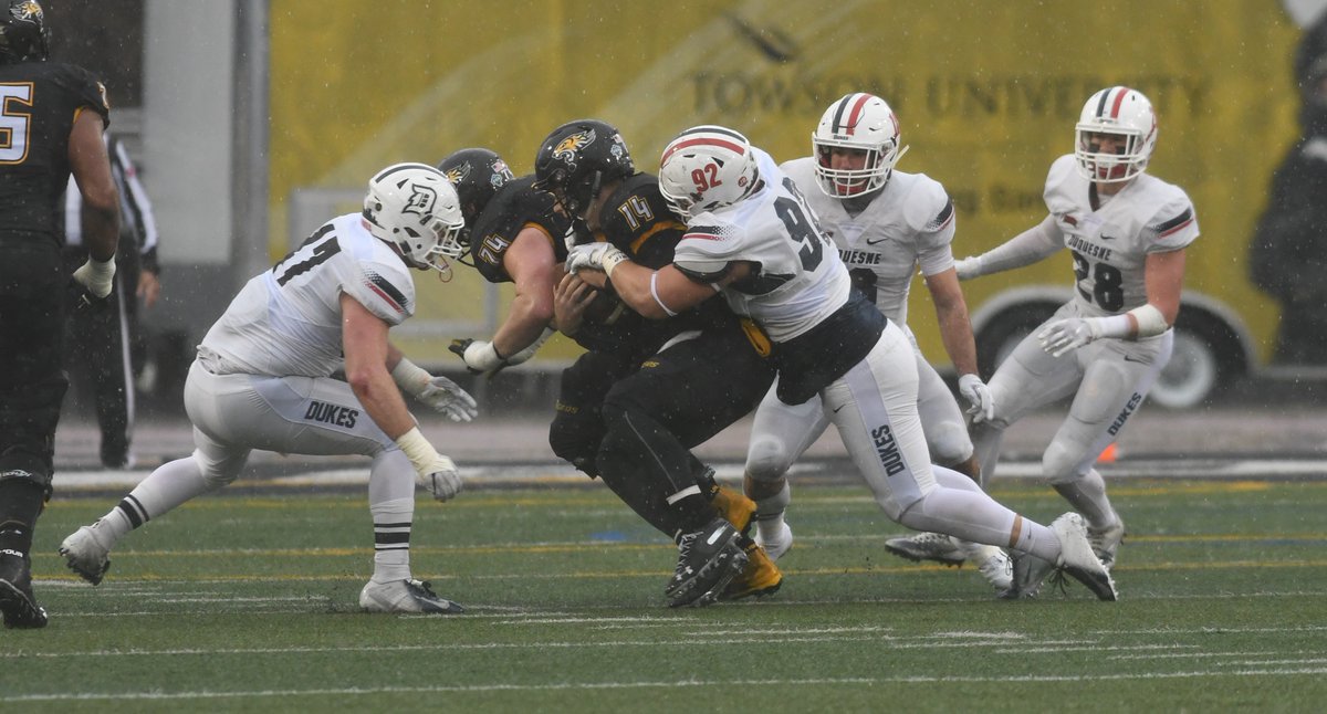 FCS Playoffs: In Maryland Downpour, Duquesne Grounds Towson, 31-10